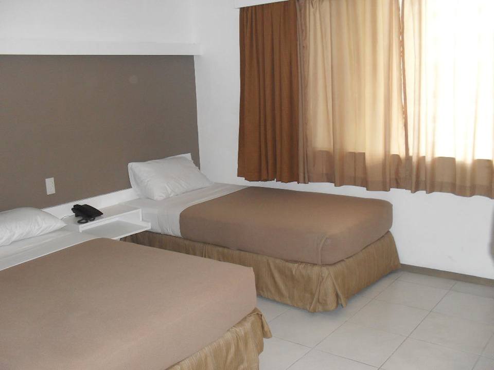 Bequeme und neue Betten. Cebu R Hotel
