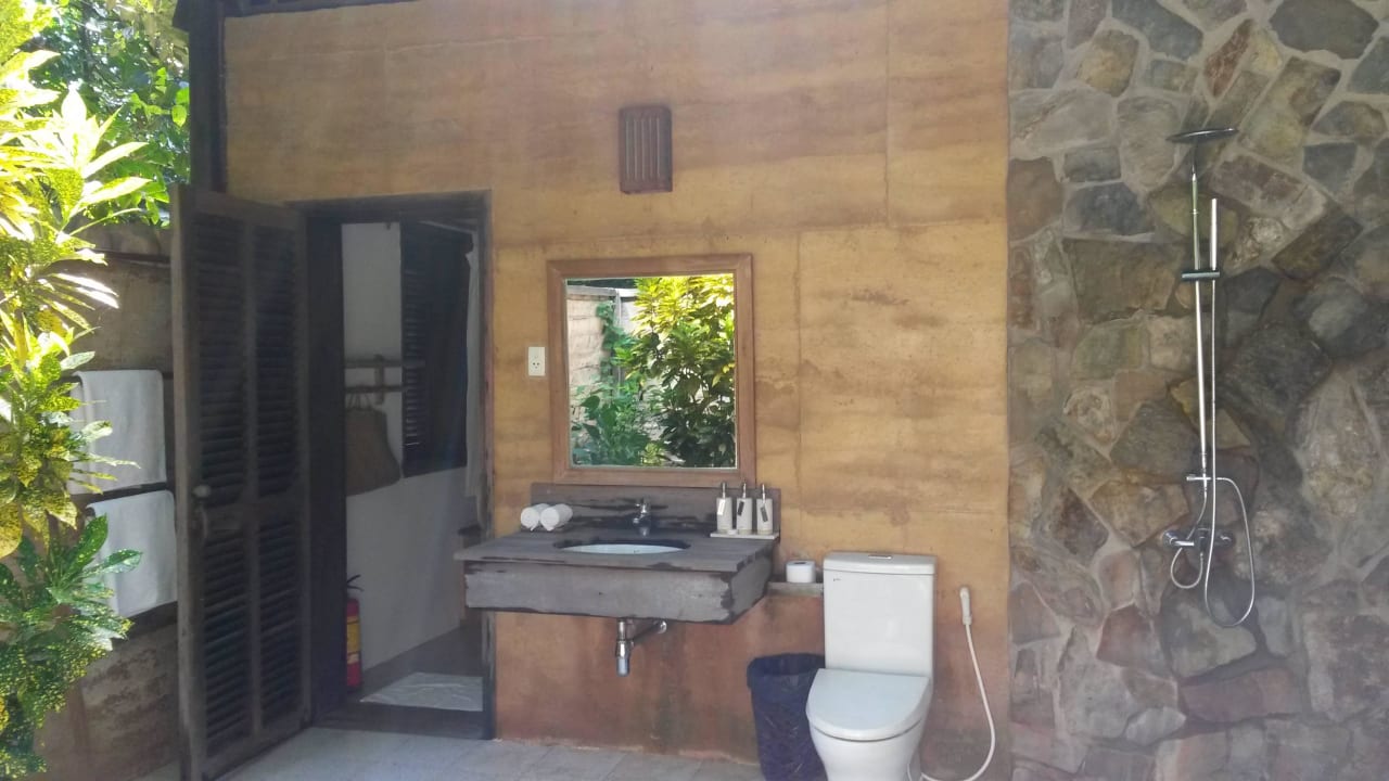 Bad im Freien Hotel Mango Bay Resort