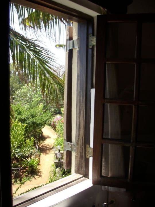 Blick aus dem Badezimmer PrideInn Flamingo Beach Resort & Spa