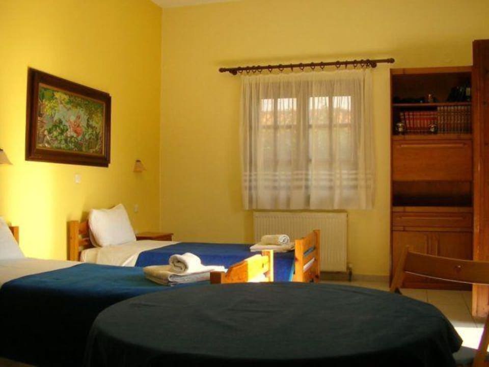 Zimmer Haus des Gartens / Pension Nikos