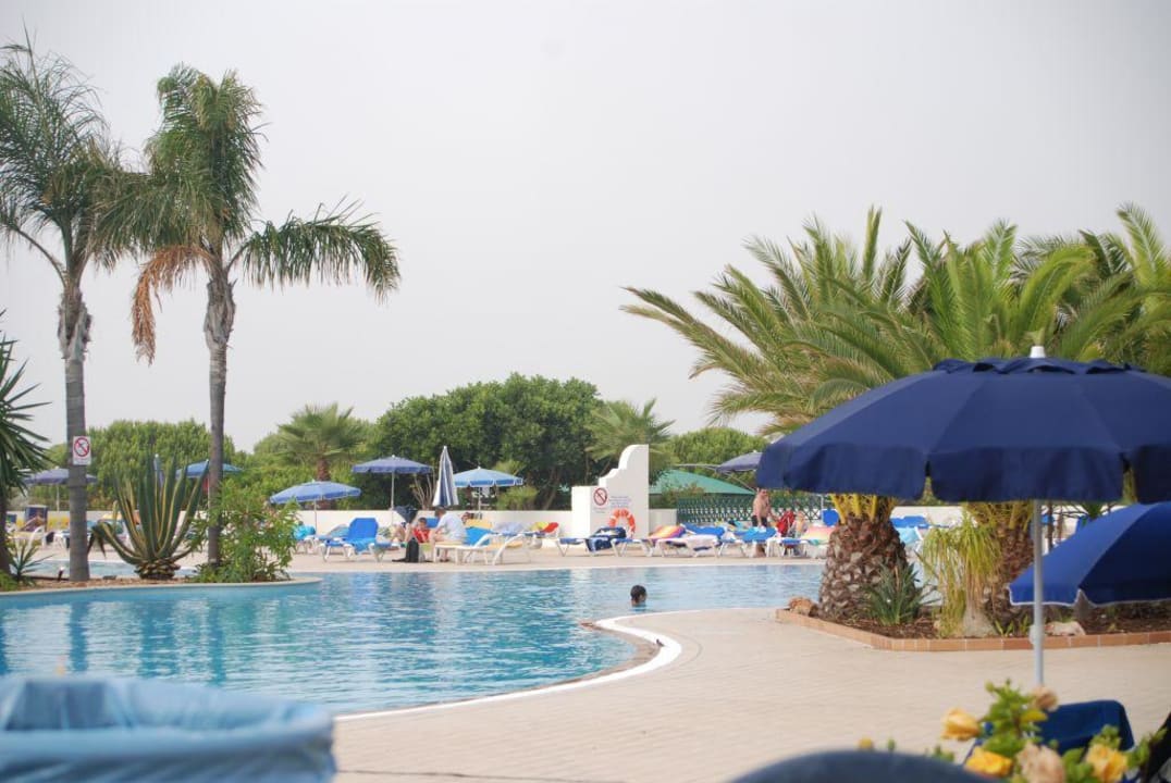 Der Pool mit Palmen AP Adriana Beach Resort