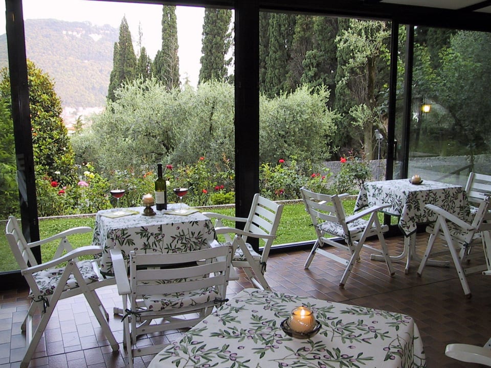 Hotel degli Olivi - veranda in the  evening  Hotel Degli Olivi