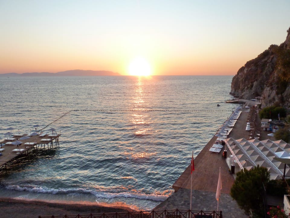 Strand am Abend Ladonia Hotels Adakule