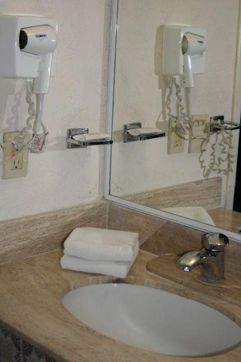 Badezimmer im Hotel El Castellano Gamma by Fiesta Inn Mérida El Castellano