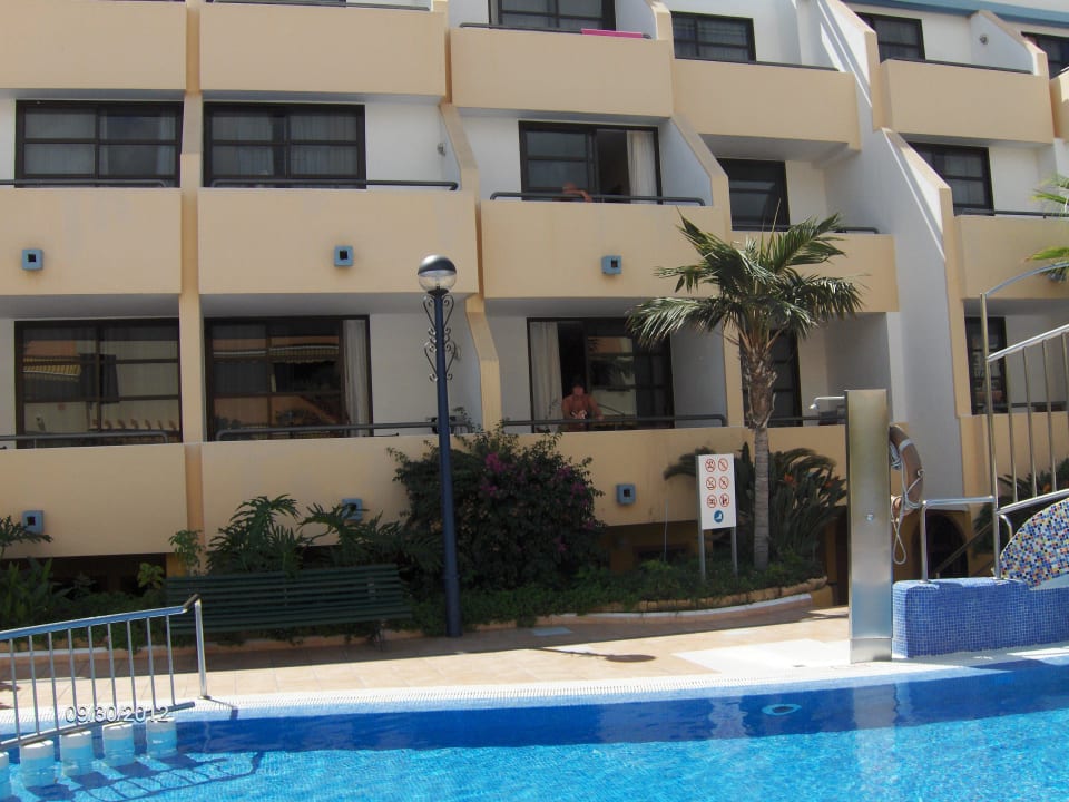 Room 116. Above the pool sign. Perfect location. Apartments Colon II