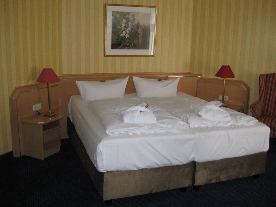 Bett in der Suite Europa Hotel Kühlungsborn