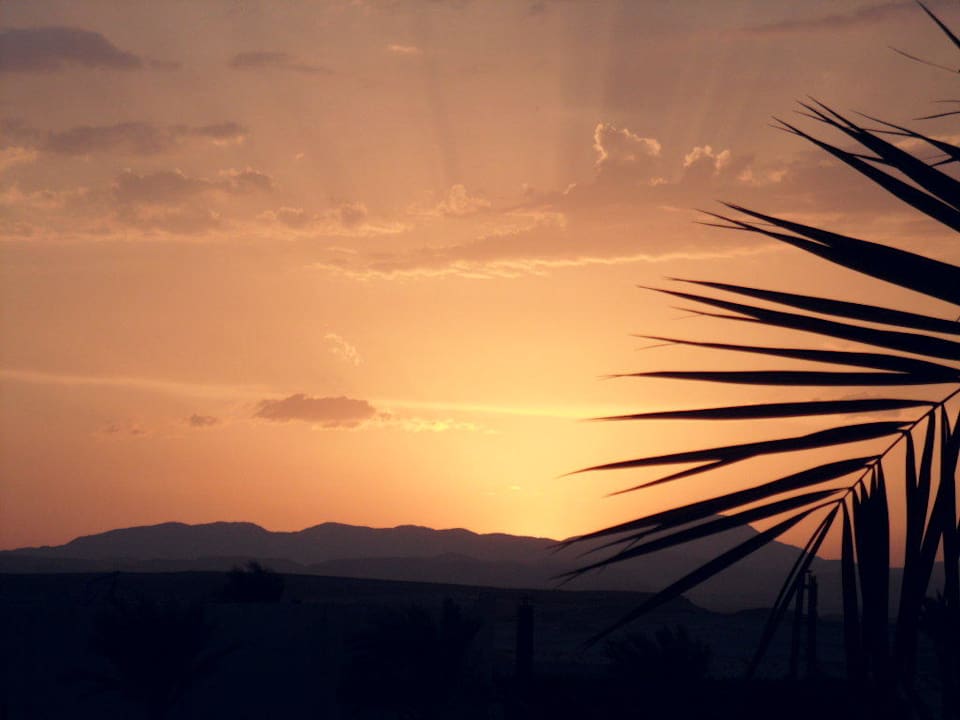 Sonnenuntergang Three Corners Sea Beach Resort