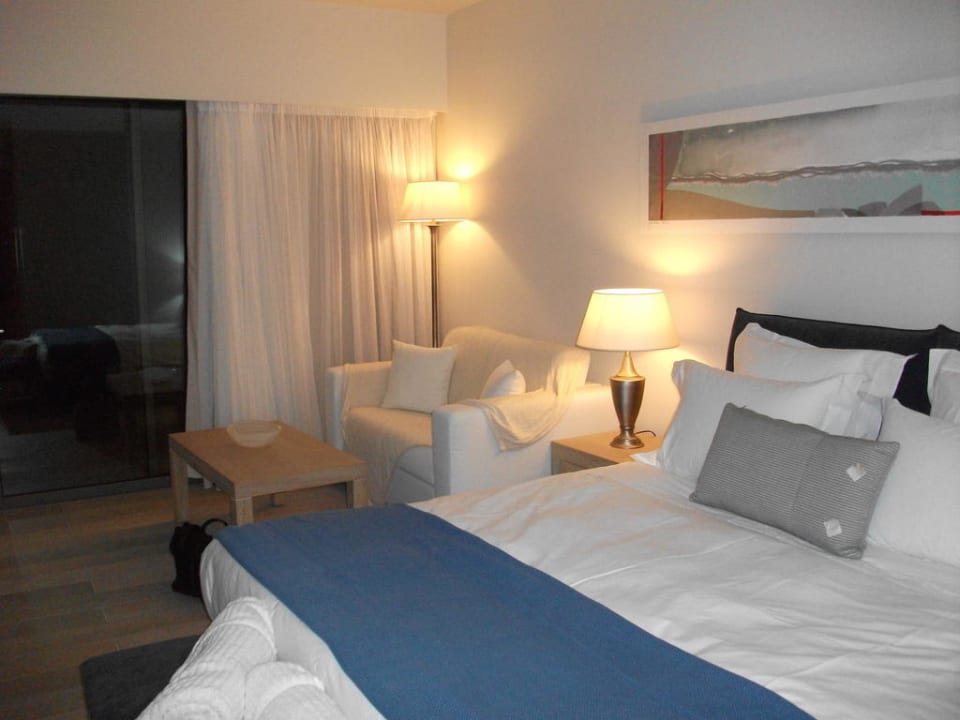 Doppelbett und Schlafcouch mit Blick Terrasse Aquagrand Artistic Luxury Beach Resort - Adults only