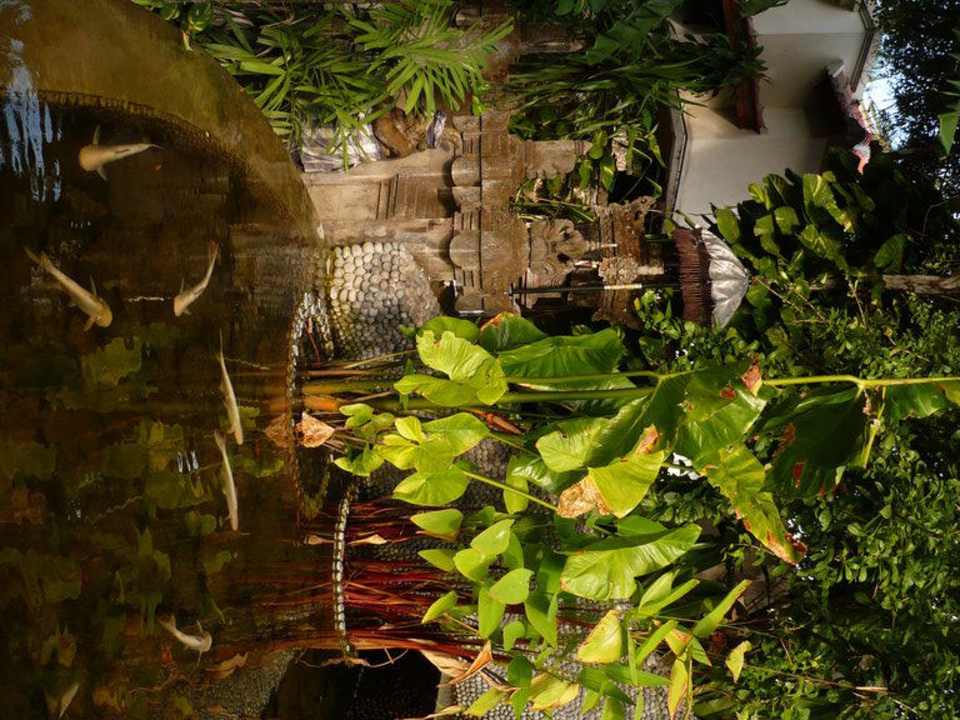 Garten des Puri Santrian Puri Santrian