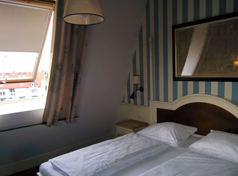 Bett im Eckzimmer Hotel Bell Rock Europa-Park