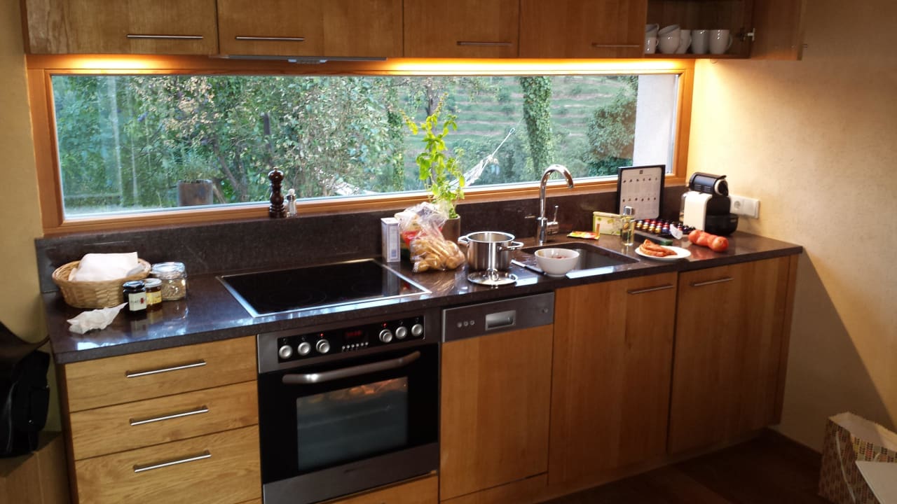 Küchenzeile mit Ausblick PURESLeben Ferienhaus Lieschnegg am Tunauberg