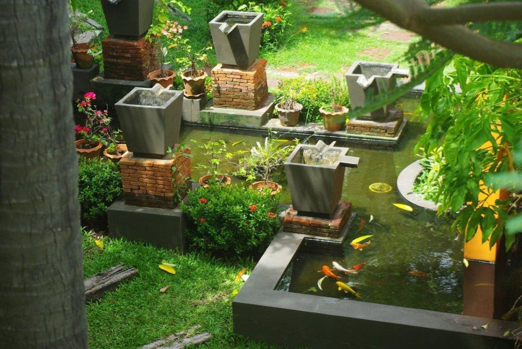 Garten mit Teich Hotel Saboey Resort & Villas