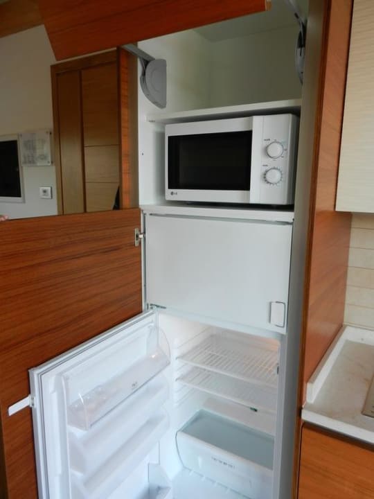 Kühlschrank und Mikroherd Green Village Resort - Hotel & Aparthotel