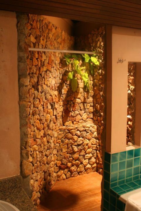 Badezimmer im Grand Deluxe Bungalow The Fair House Beach Resort