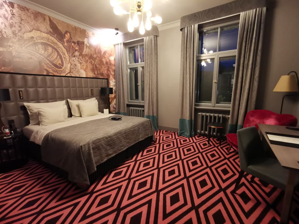 Zimmer Grand Poet Hotel by Semarah