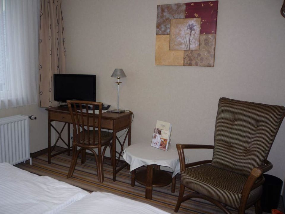 Sitzecke mit TV Göbel's Gästehaus Dorf Alm