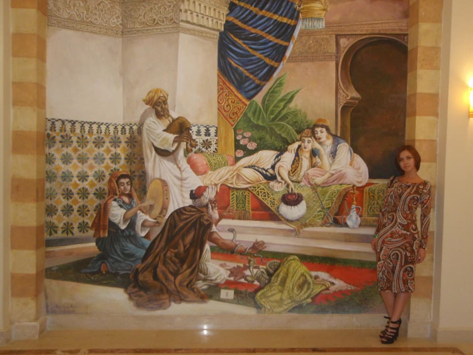 The mosaic pattern near the restaurant Rehana Royal Beach Resort Aqua Park & Spa