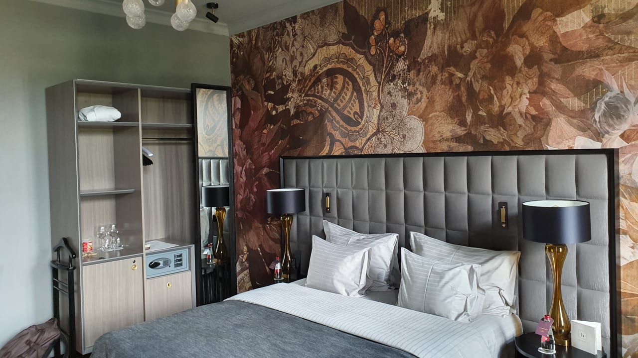 Zimmer Grand Poet Hotel by Semarah