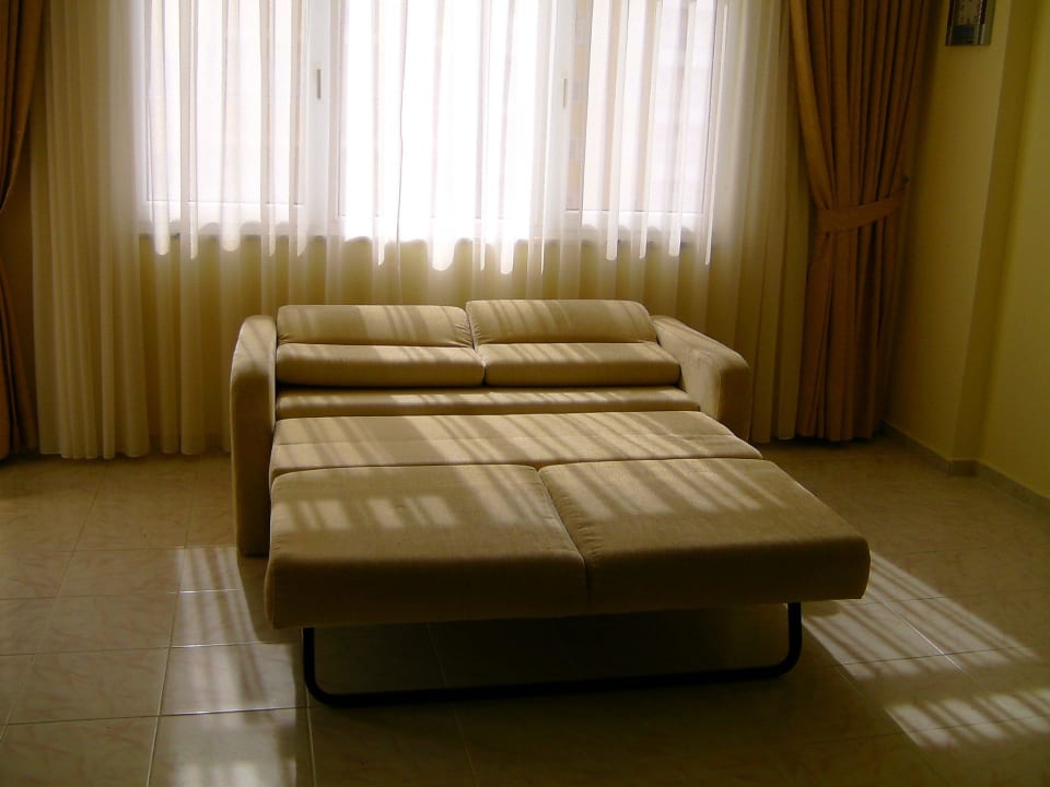 Sofa bed in the living Apartments Barbaros
