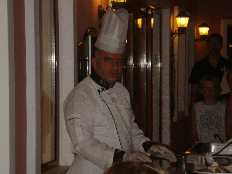 Der stolze Chef-Koch Club Grand Side