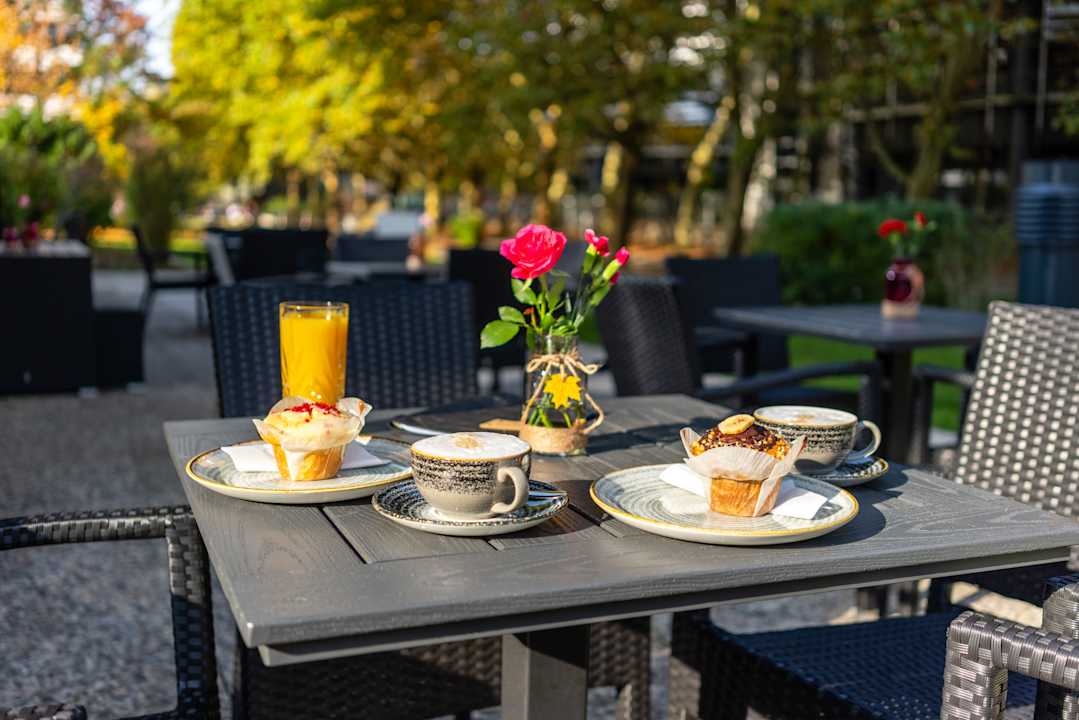 Gartenanlage my4walls Serviced Apartments