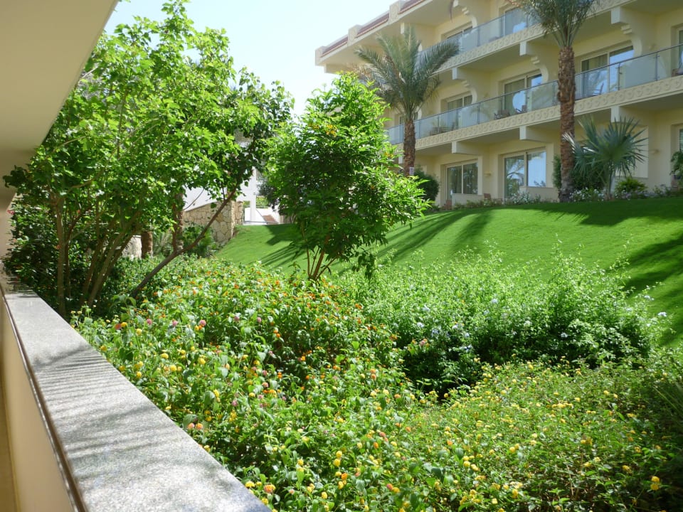 Immer Grün- oder Poolanlagen zwischen den Blocks Hotel Xperience Sea Breeze Resort