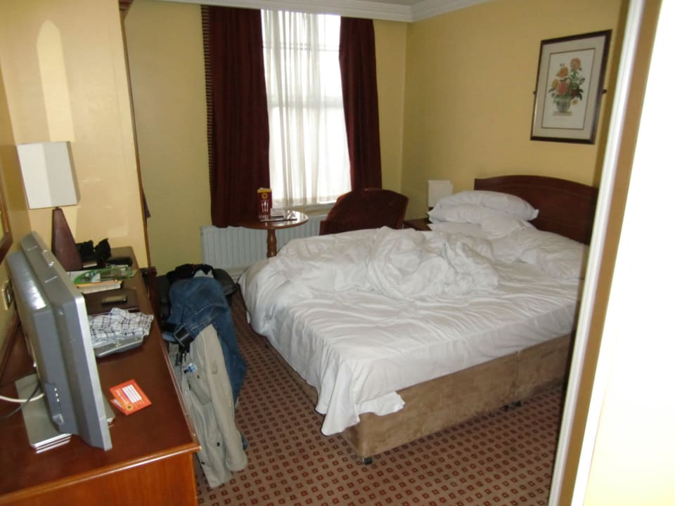 Einzelzimmer im Kingsizebett Hotel Cassidys