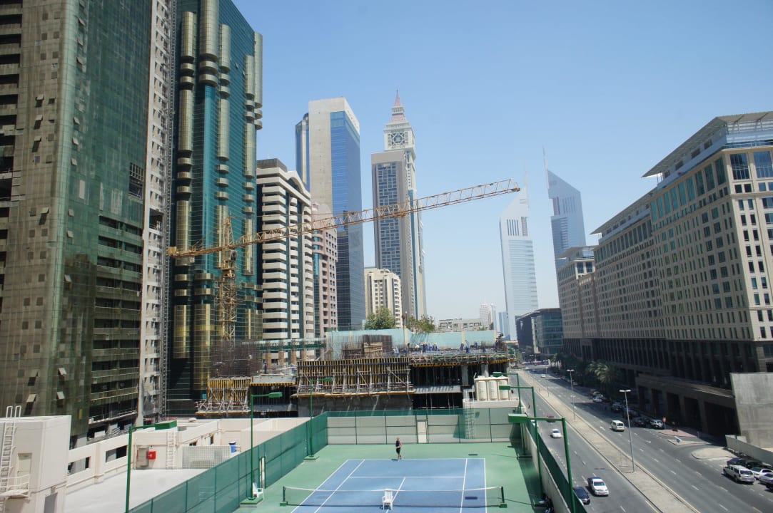 Вид с террасы бассейна днём Rose Rayhaan by Rotana