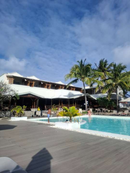 Pool Le Peninsula Bay Beach Resort & Spa