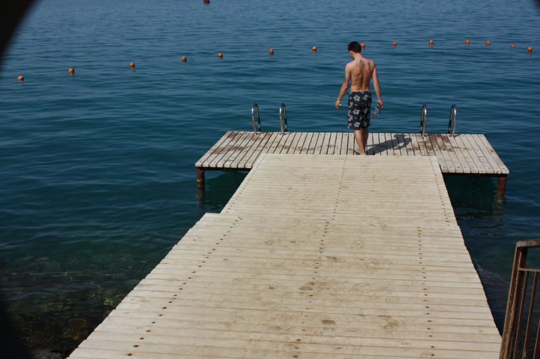 Steg am Hotel , direkter Zugang zum Meer Hotel Three Corners Ocean View prestige - Adults only