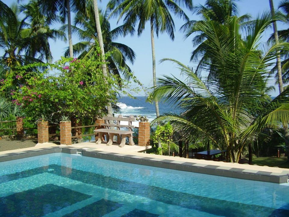 Swimming pool with sea view Isolabella Ayurvedic Hotel