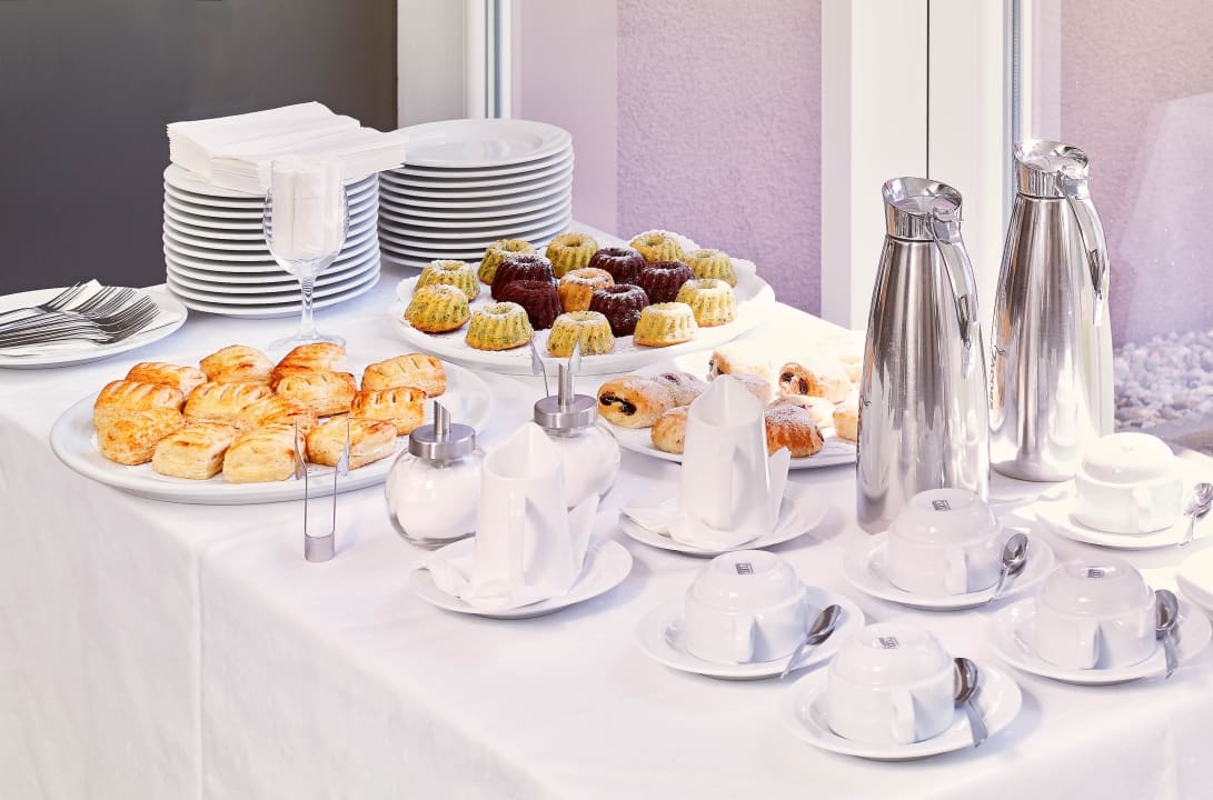 Kaffeepause süß acom Hotel München