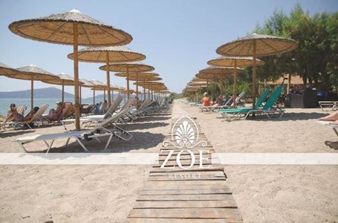 Free of charge sunbeds and umbrella  Zoe Resort