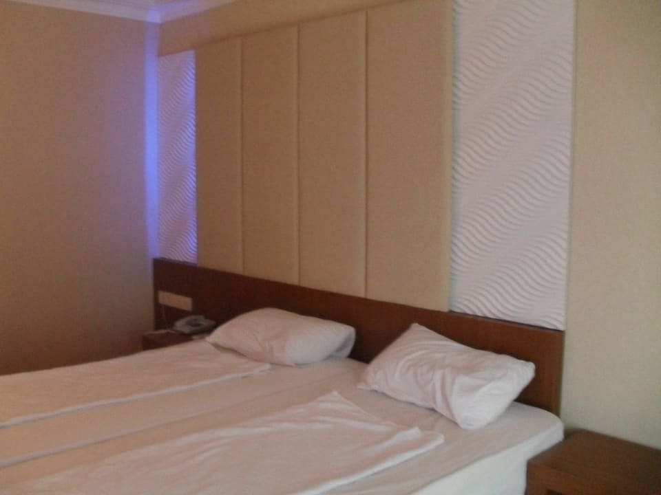 Schlafbereich Tac Premier Hotel & Spa