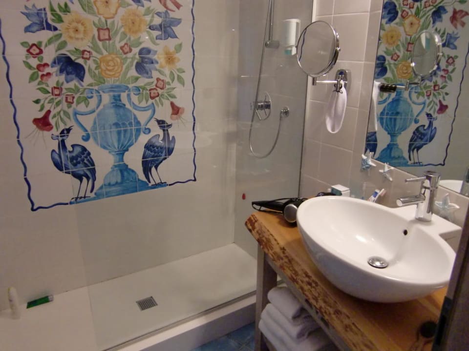 Badezimmer Hotel Resort & Spa Baia Caddinas