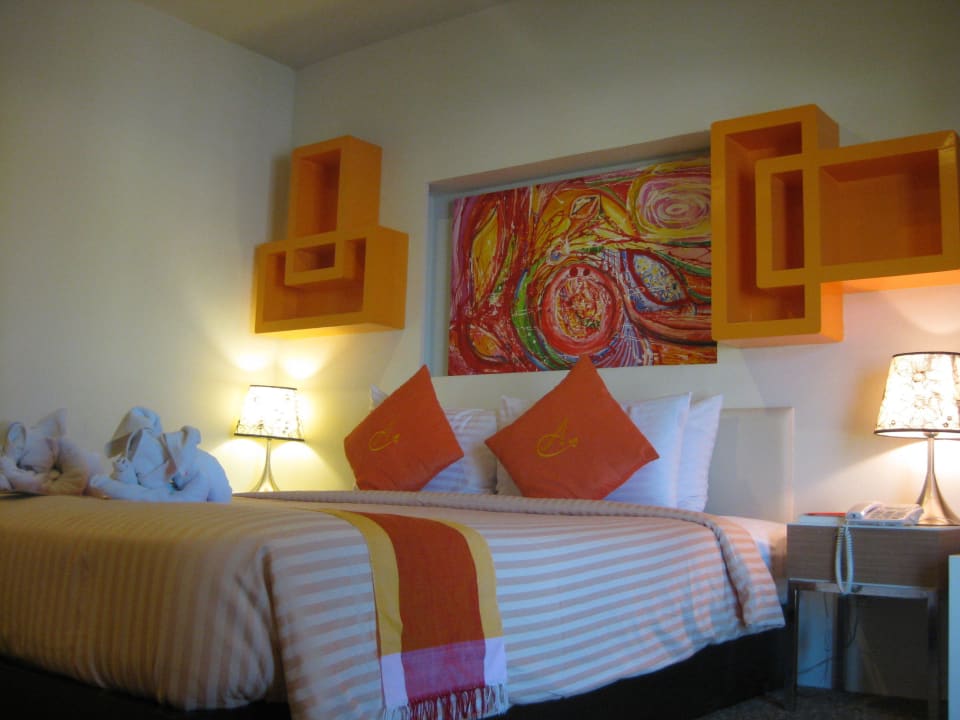 Blick auf das Bett Hotel Ayara Grand Palace