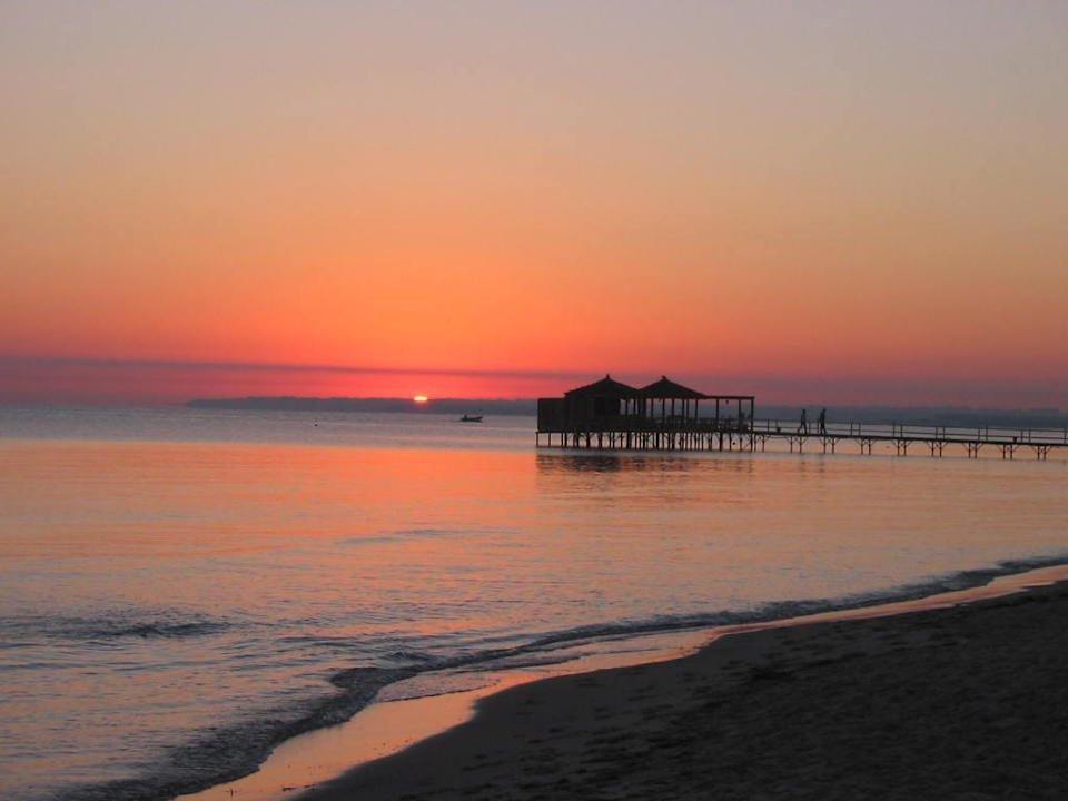 Sonnenaufgang am Hotelstrand Houda Golf & Beach Club