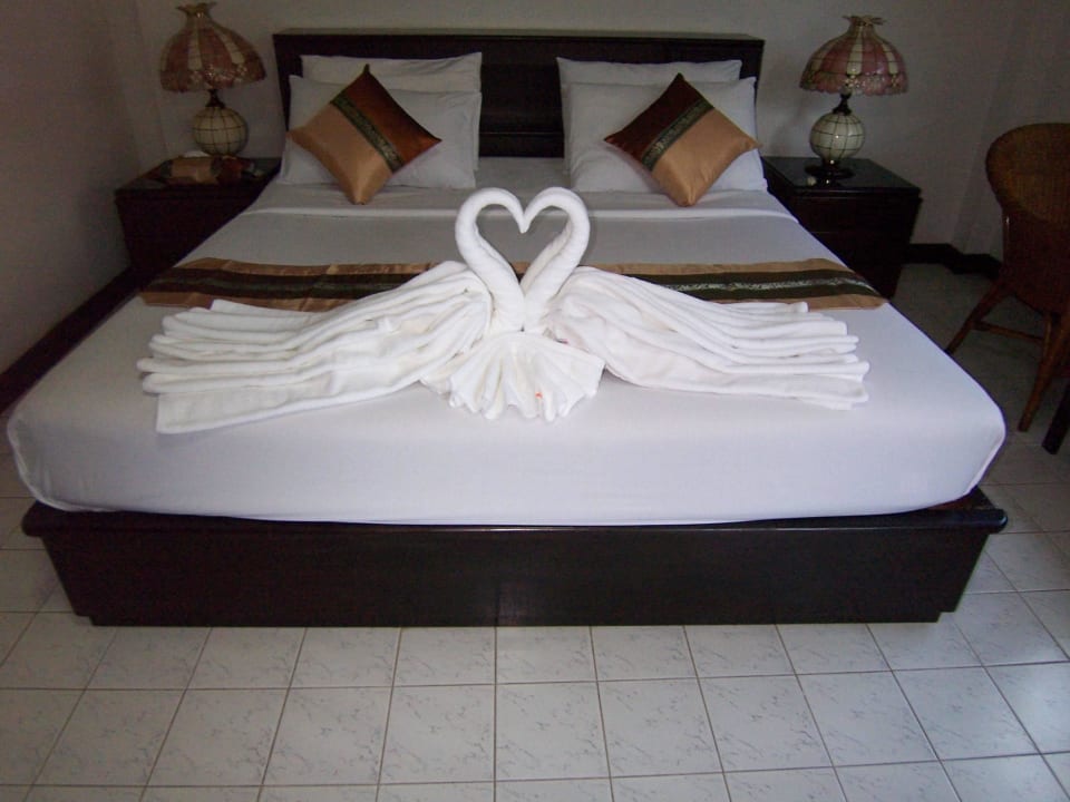 Standardzimmer Bett Hotel Swiss Garden