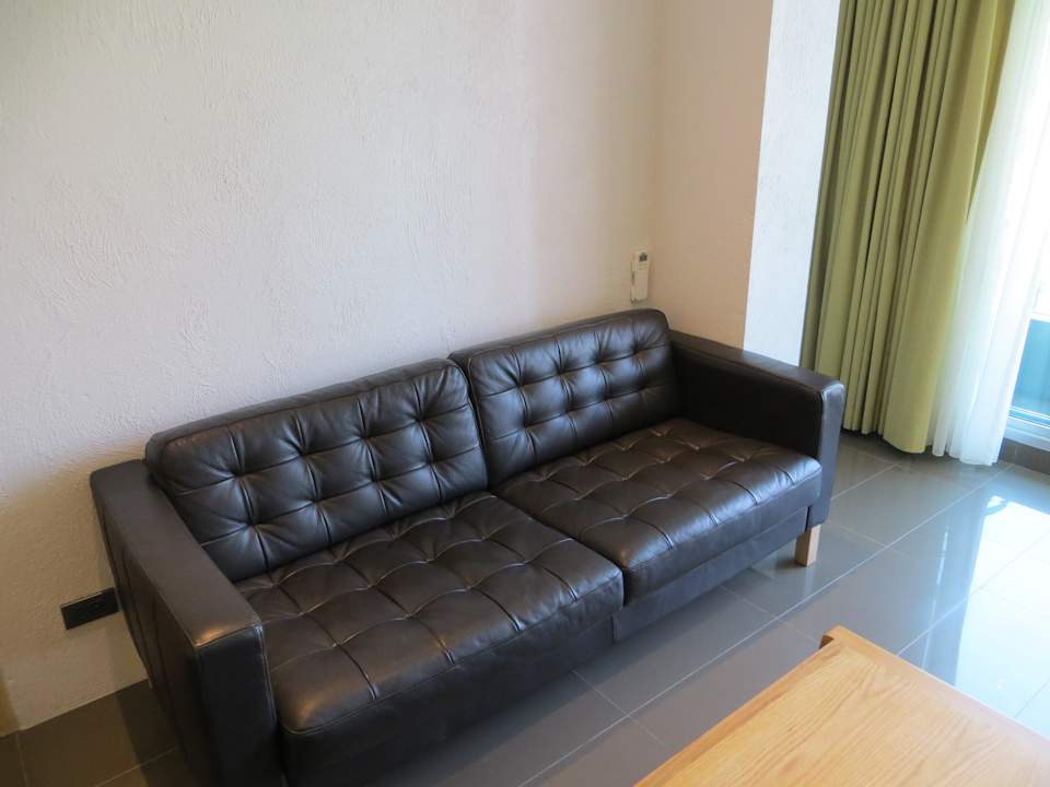 Sofa Balcony Seaside Serviced Apartments