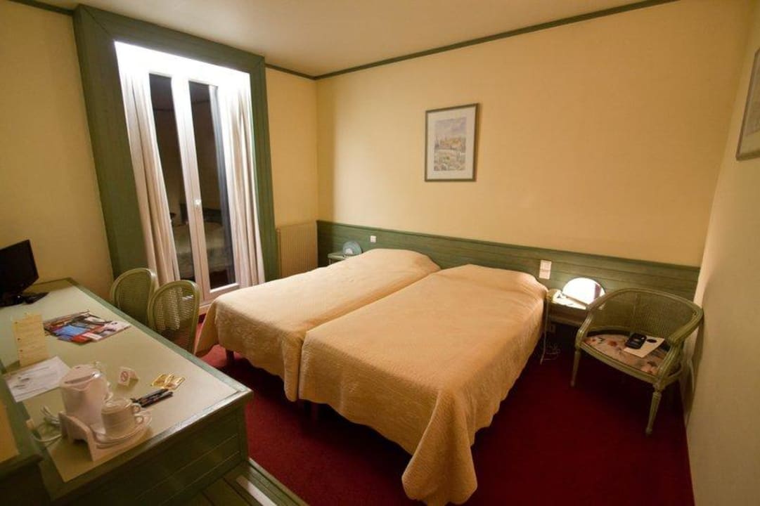 Doppelbett im Zimmer Hotel Vendôme