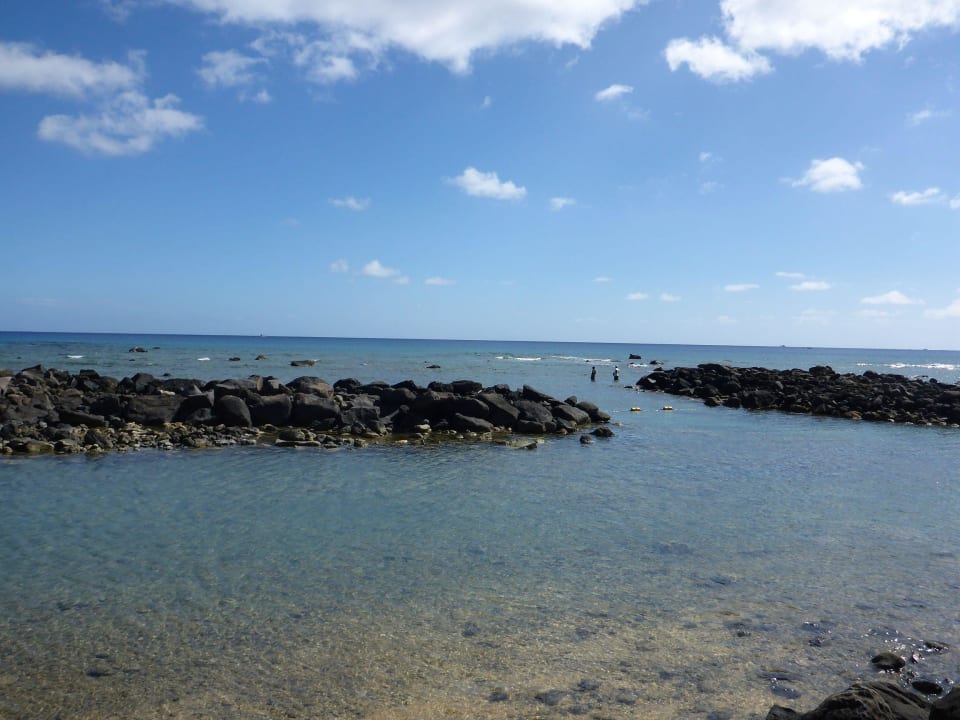 Aufgeschüttete Hotelbucht mit Lavasteinen Veranda Pointe aux Biches Hotel