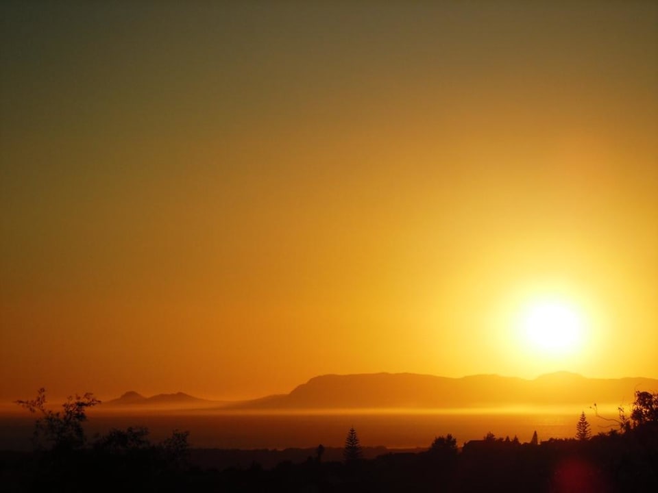 Sonnenuntergang vom Sonnendeck aus Southern Cross Guesthouse