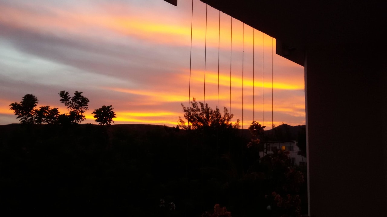 Der Sonnenutergang vom Balkon aus allsun App.-Hotel Esquinzo Beach