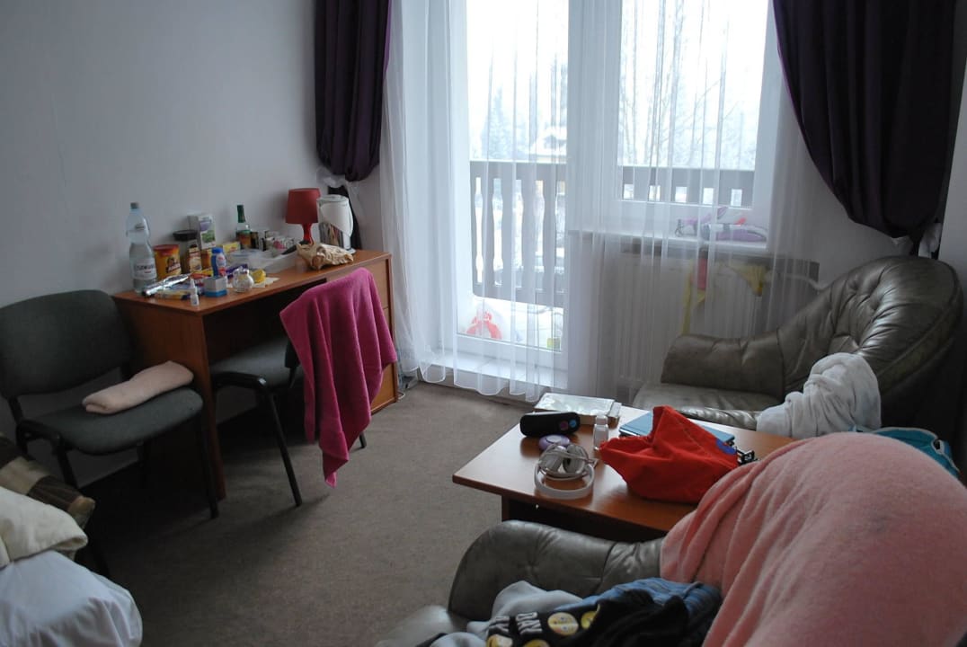 Pokój z balkonem z dziurą w drzwiach Hotel Corum