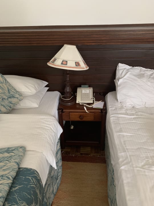 Zimmer Travellers Beach Hotel & Club