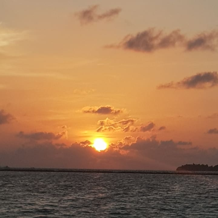 Sonnenuntergang  Adaaran Select Meedhupparu Island Resort - Premium All Inclusive