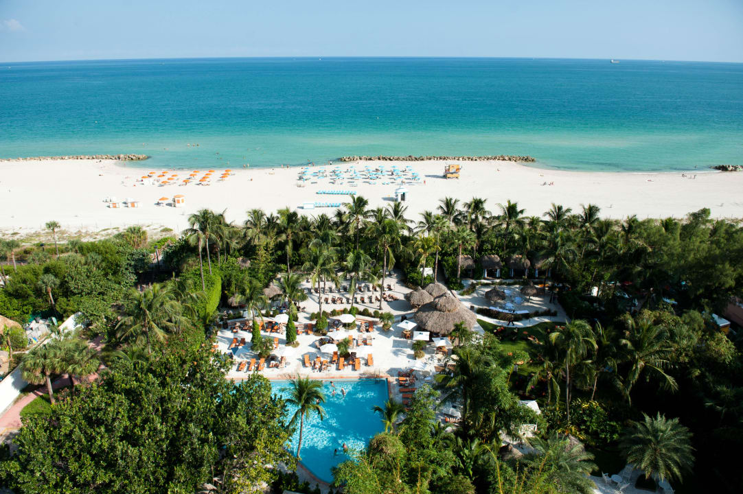 Garten und Strand The Palms Hotel & Spa