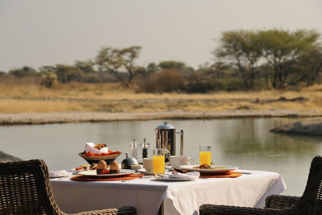 Breakfast next to the waterhole Onguma Game Reserve