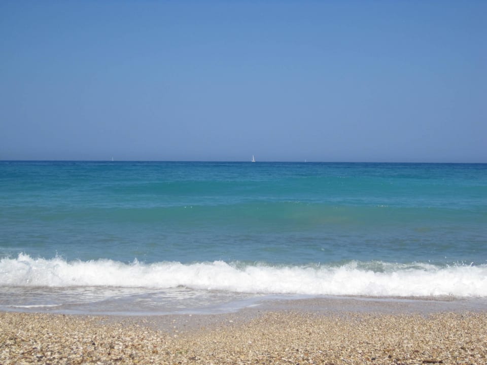 Einsamer Strand am Meer Hotel Bostonia Village