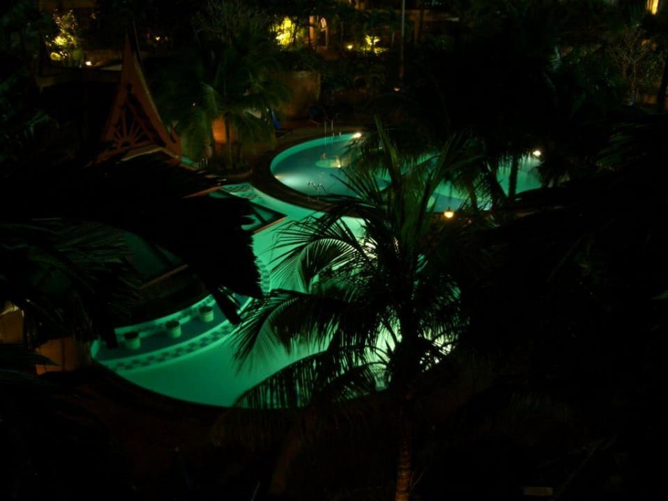 Pool by night Chada Thai Village Resort